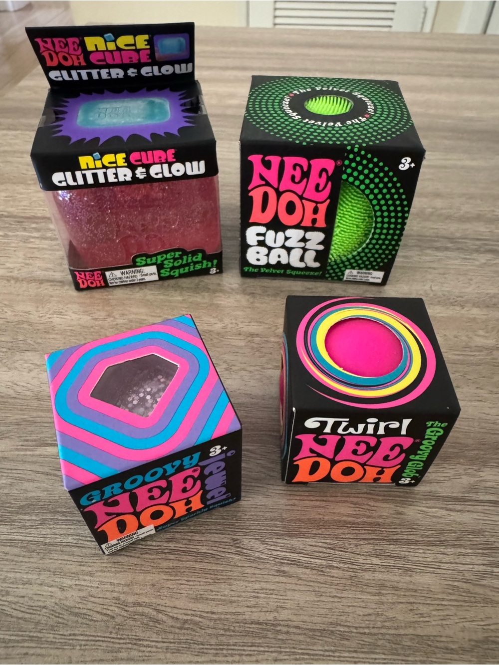 Nee Doh Nice Cube Glitter & Glow / Fuzz Ball & 2 mini nee doh. Set of 4. NEW